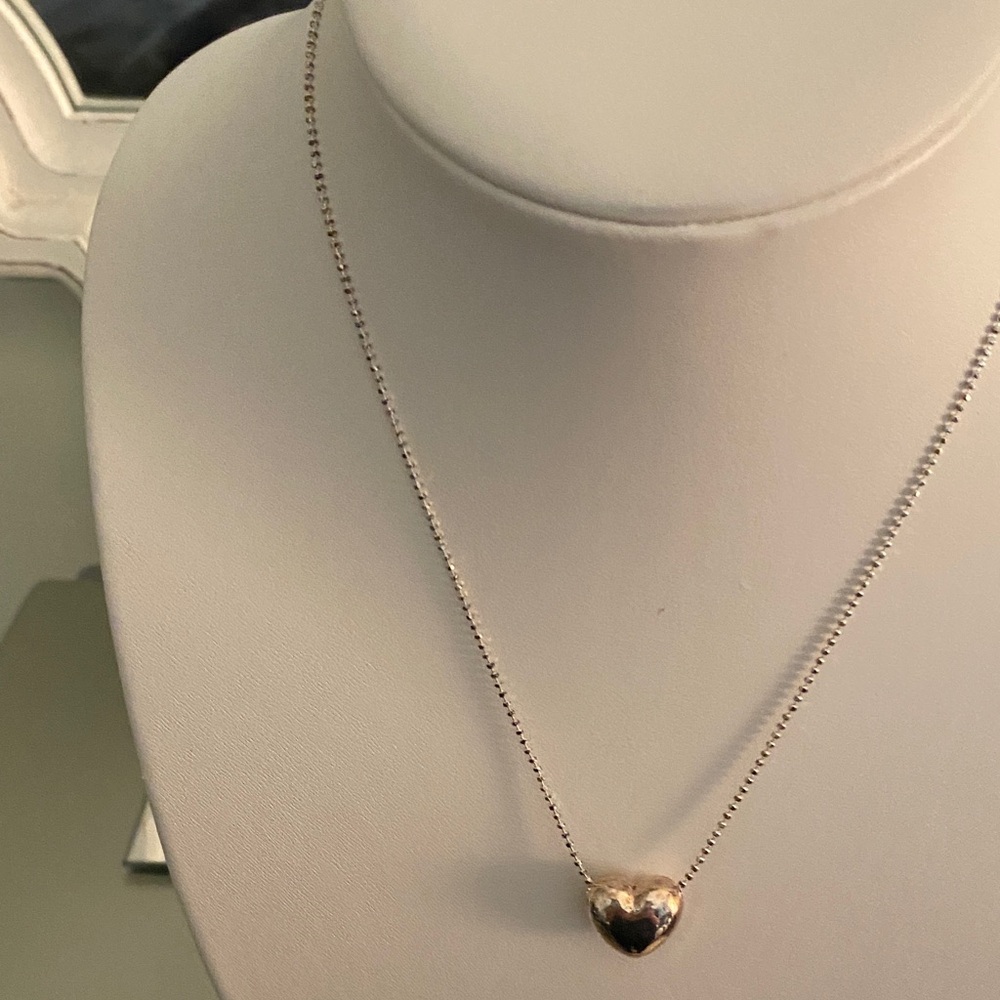 Dainty sterling silver heart necklace and earrings.